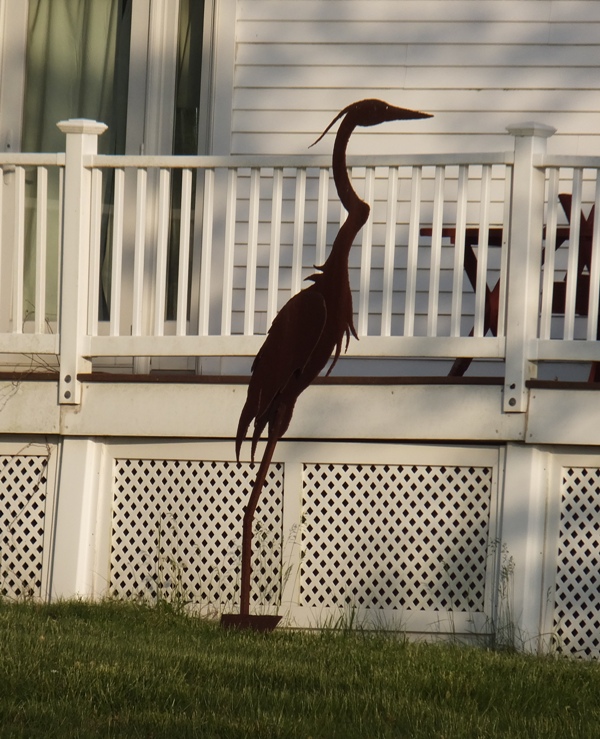 Metal heron sculpture