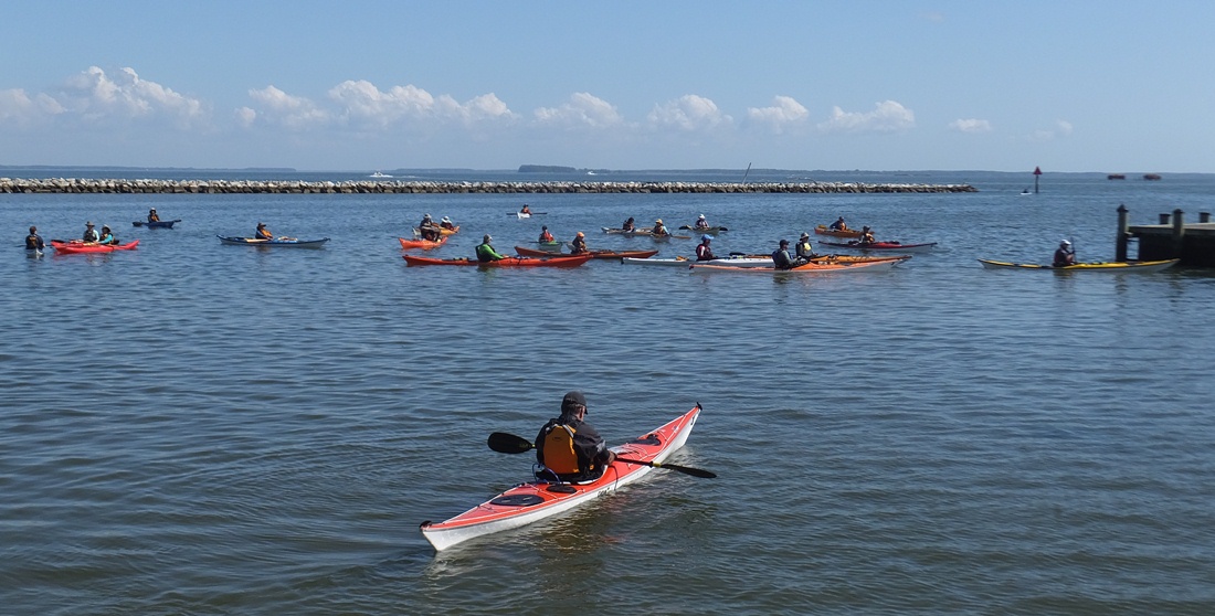 Kayakers waiting to land