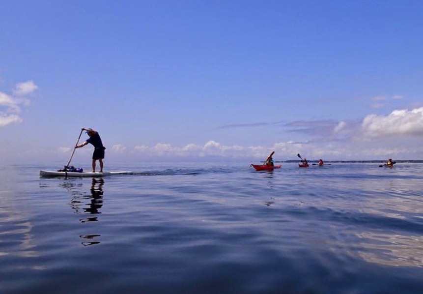 Me towing kayaks from my SUP