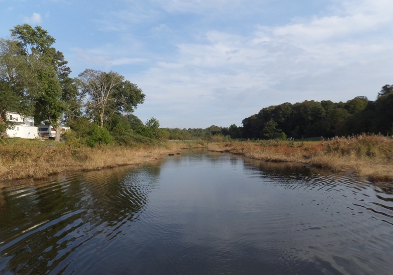 House near narrow creek