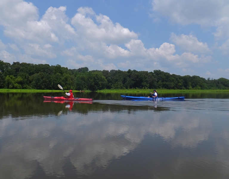 Jana and Katharina kayaking across lake