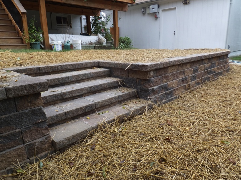Retaining wall, steps, and straw
