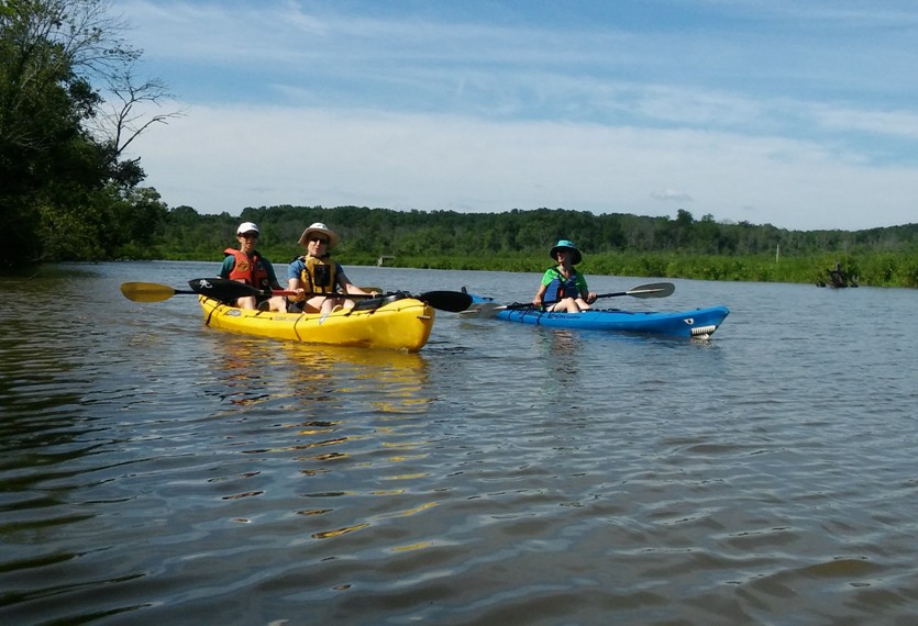 Norma and Yvette in tandem kayak with Susana in single