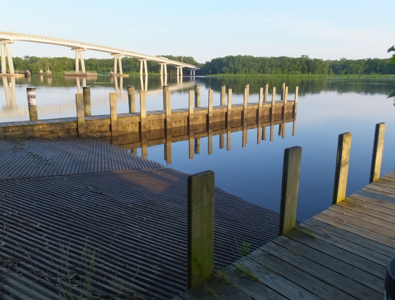 Boat ramp with bridge in background