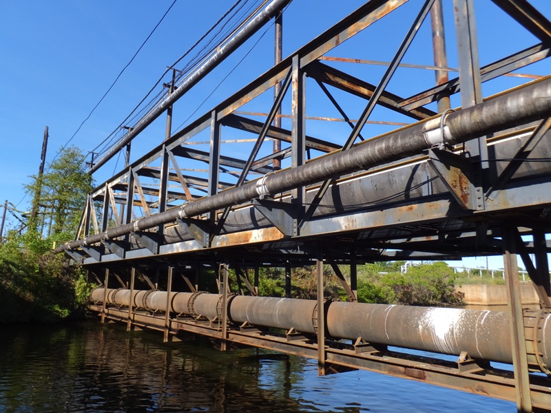 Several pipes above the water