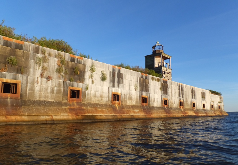 Lighthouse and illuminated wall