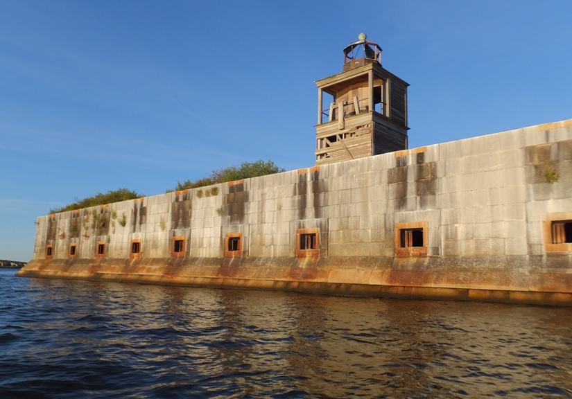 Lighthouse and illuminated wall