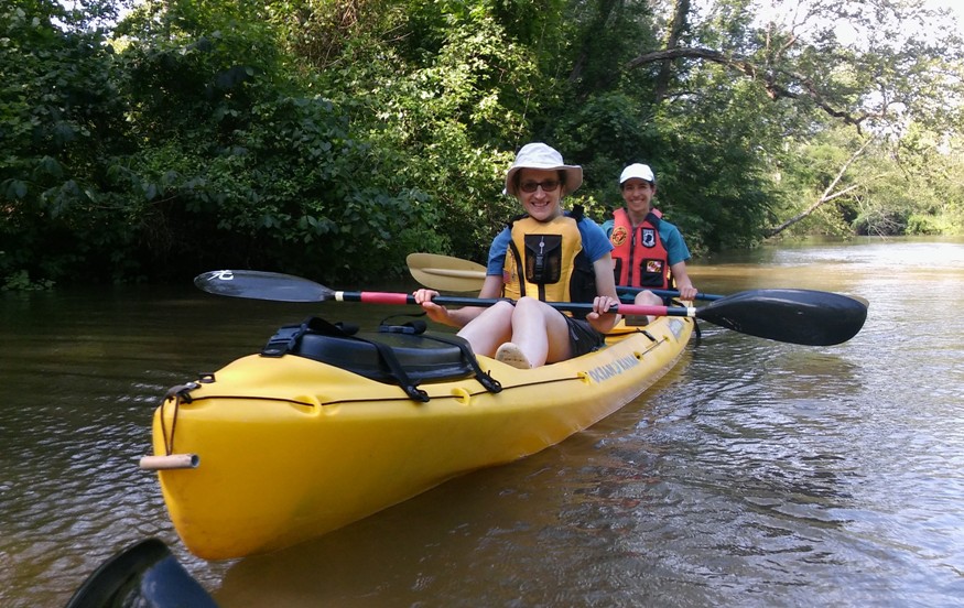 Norma and Yvette in kayak, smiling