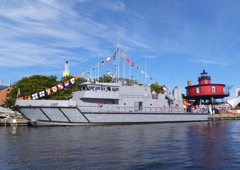 YP Craft next to Seven Foot Knoll Lighthouse