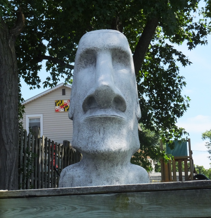Stone carving resembling those at Easter Island but in someone's yard
