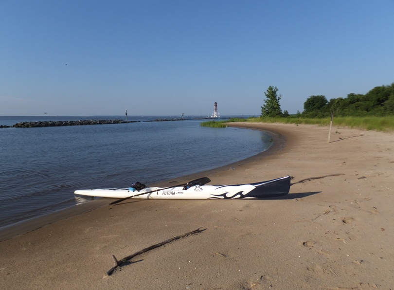 My surfski on the beach at Pleasure Island with the Craighill Channel Lower (Range) Rear lighthouse in the background