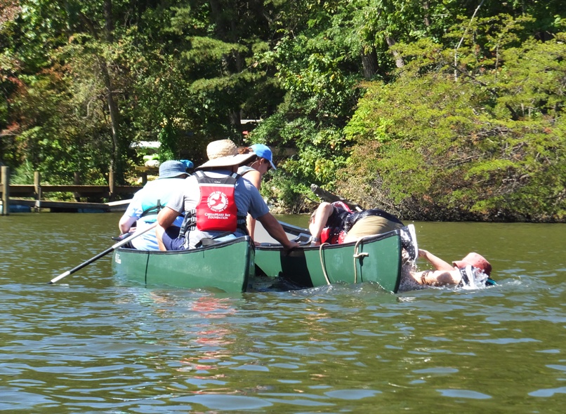 Kids getting back into canoe