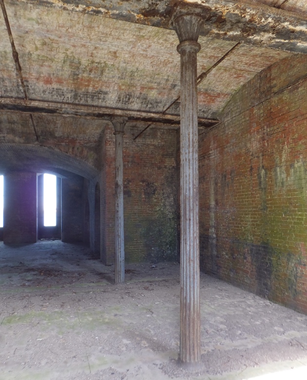 Two ceiling support columns