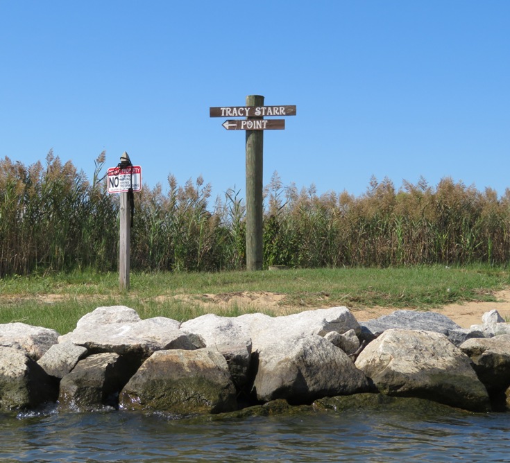 Sign indicating entrance to creek