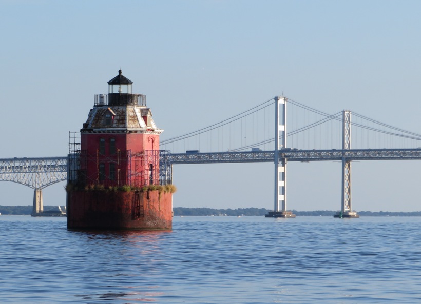 The Chesapeake Bay Bridge behind the Sandy Point Shoal Lighthouse