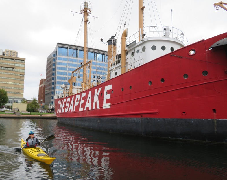 Sara paddling by the Lightship Chesapeake