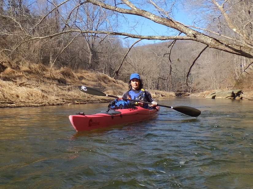 Me in kayak, wearing appropriate clothes for the water temperature