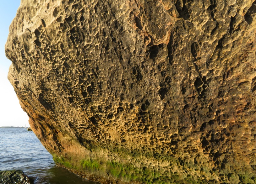 Rocks with lots of craters, perhaps made by bubbles