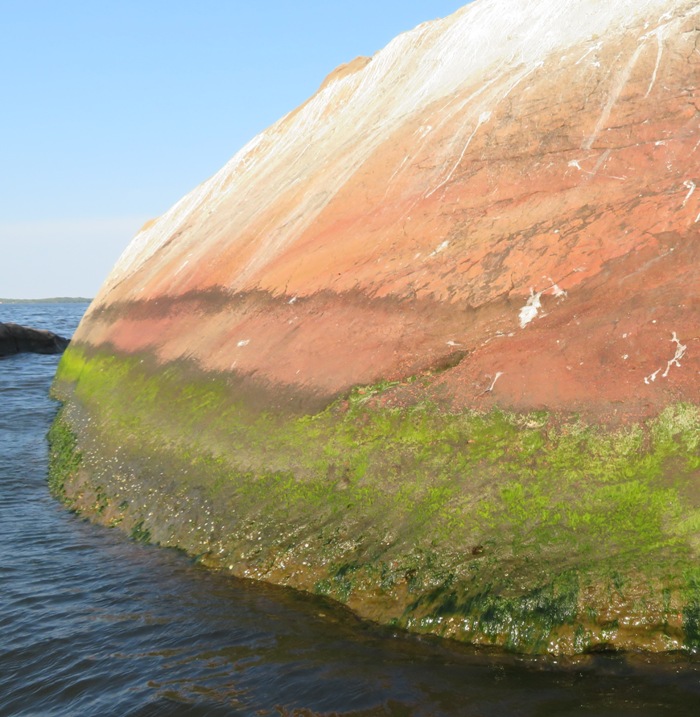 Rock that changes from green to red to pink to white