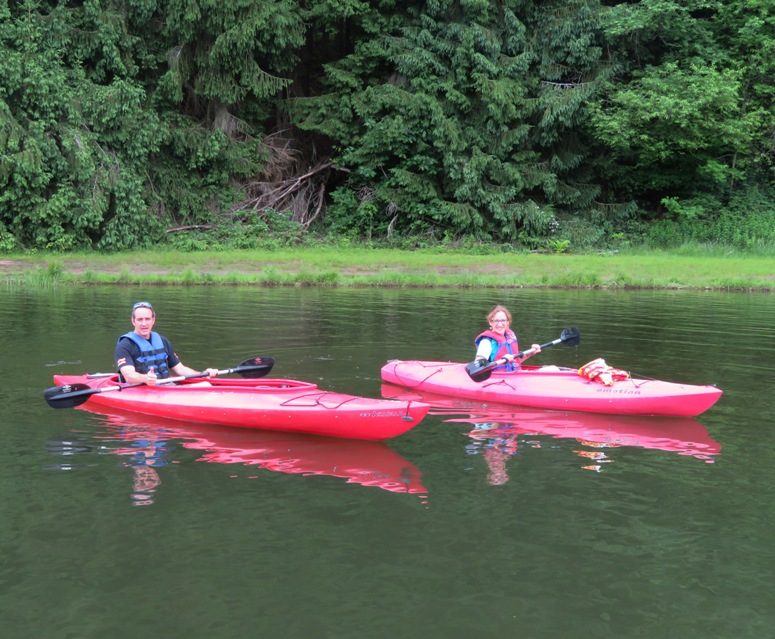 Jimmy and Norma, each in a kayak