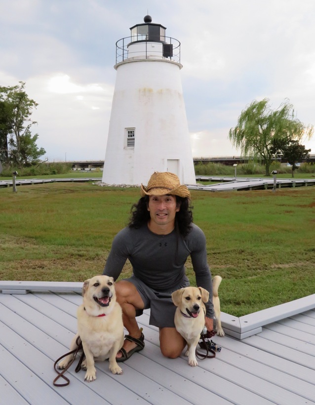 Me with Murphy and Daphne and the lighthouse in the background