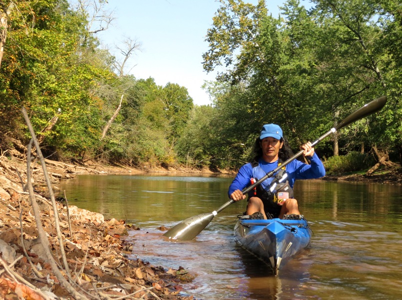 Me kayking on Broad Run, near the shore