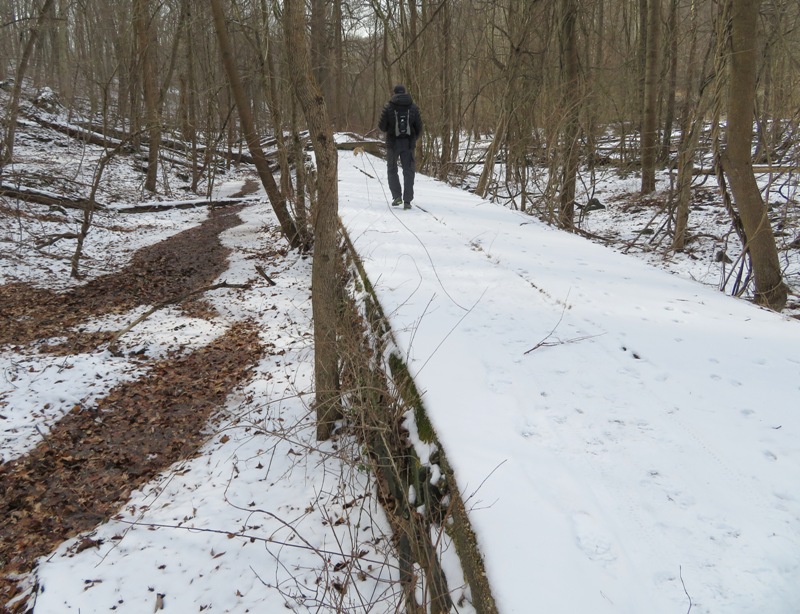 Jason walking on wall of mill race