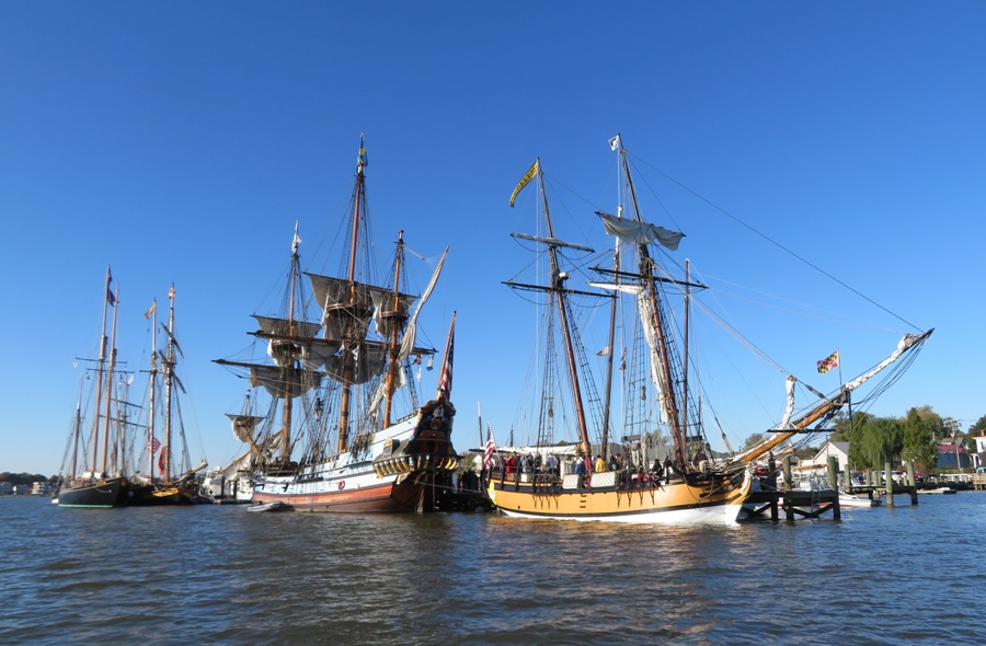 Three tall ships moored