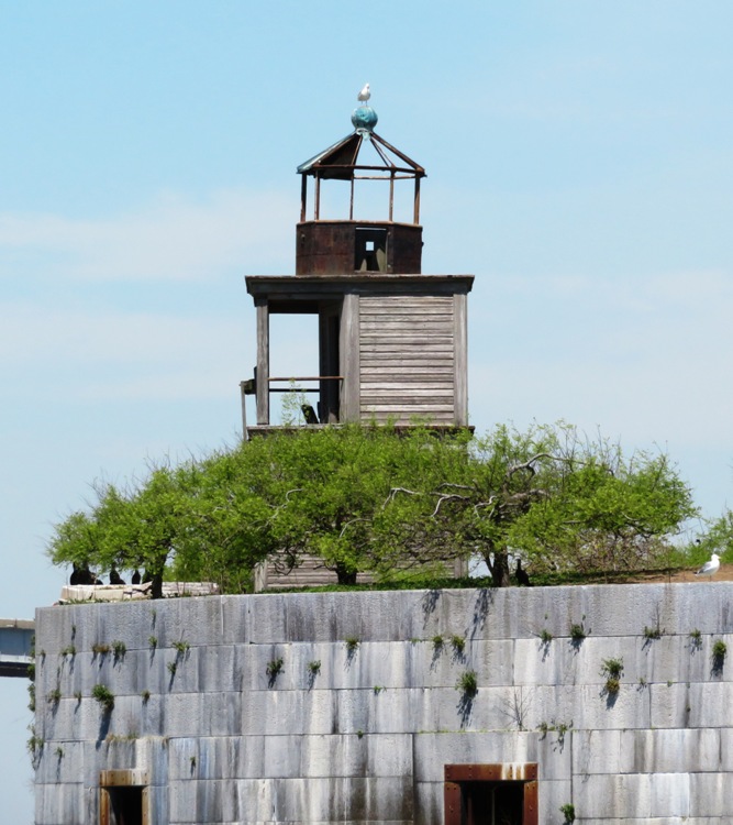Wooden Fort Carroll Lighthouse with seagull on top