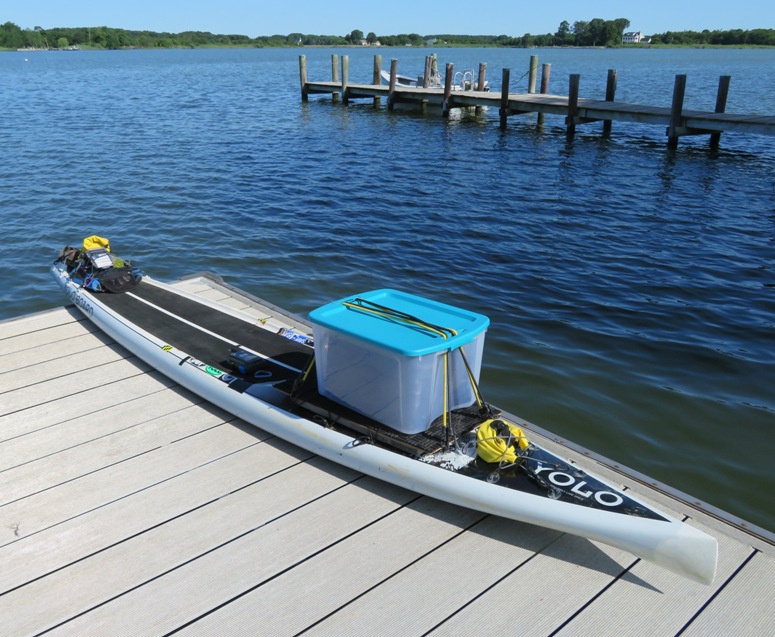 Loaded SUP on pier
