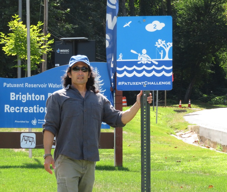 Me standing by Brighton Dam Patuxent Challenge sign