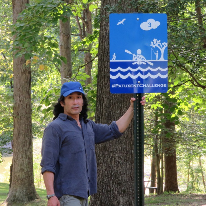 Me standing next to Scott's Cove Recreation Area Patuxent Challenge sign