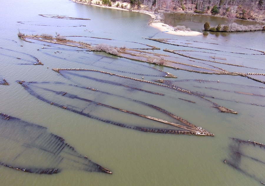 Lower altitude angled downward view of shipwrecks and Grady's Spit