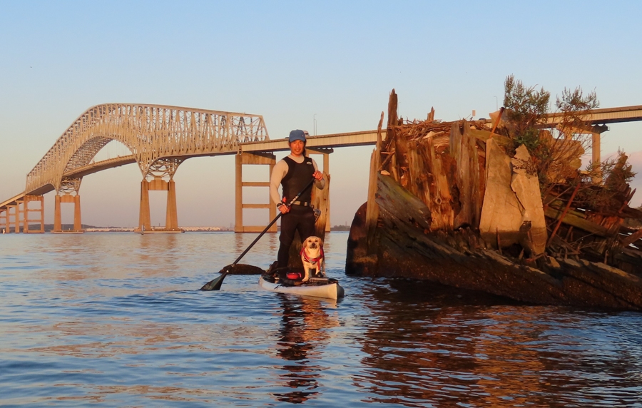 Daphne and I with wreck and bridge