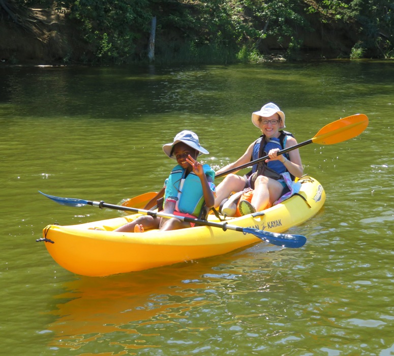 Norma and her niece in a tandem kayak