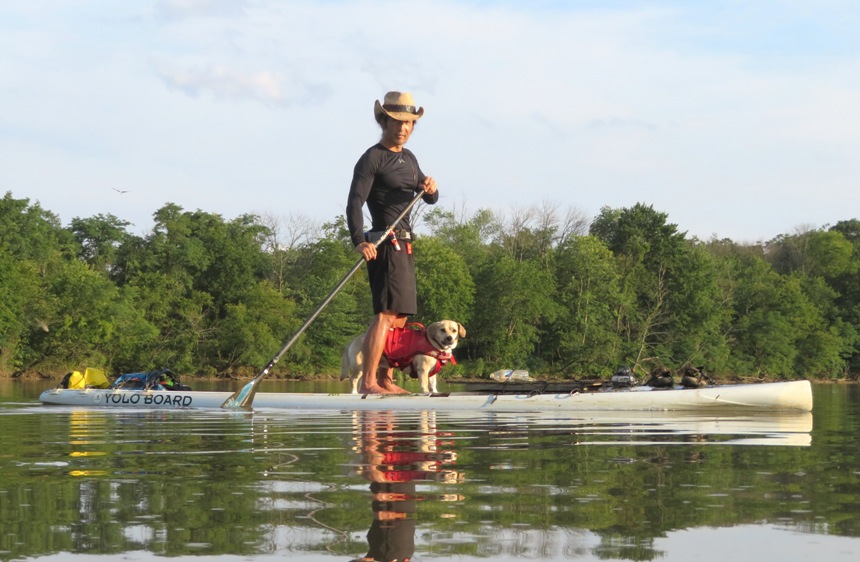 Profile of SUP with Daphne and me standing on it