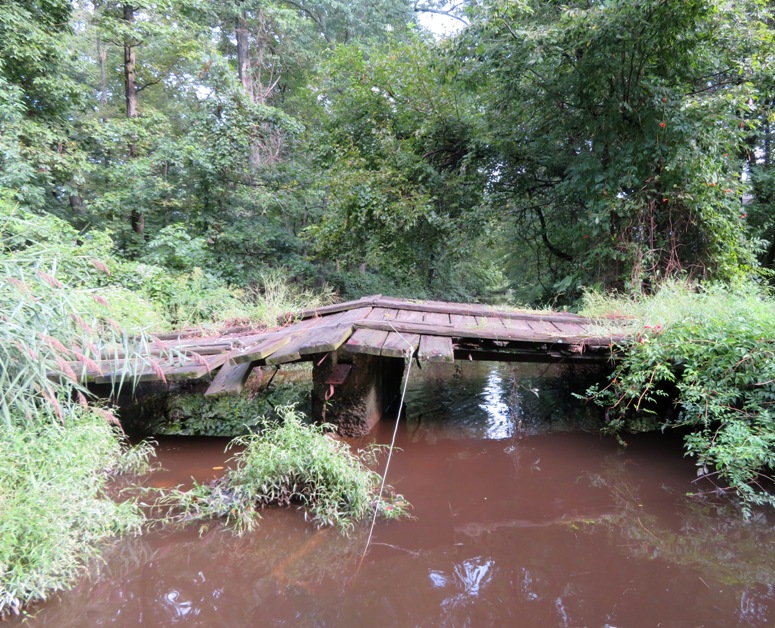 Decrepit, wooden bridge
