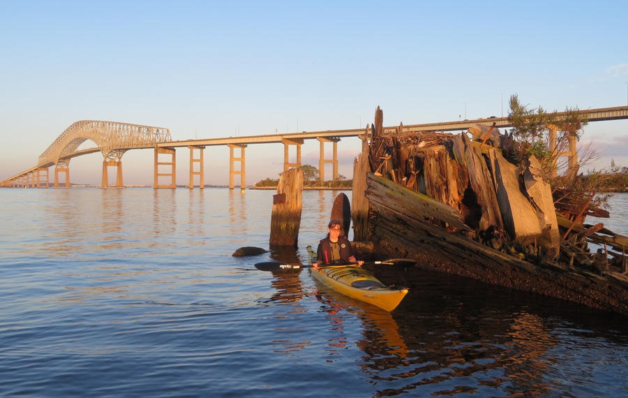 Sara with wreck and bridge