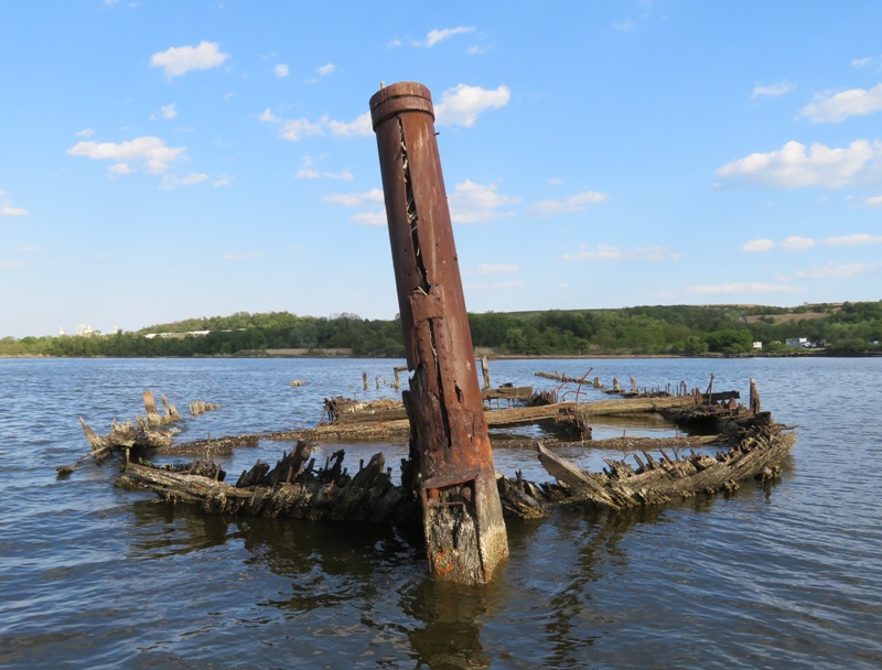 Big pipe sticking out of bow of shipwreck