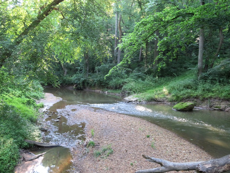 Narrow part of river where a road crosses it