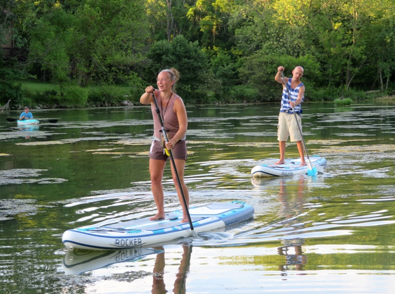 Esther and Richard paddleboarding on Lake Elkhorn