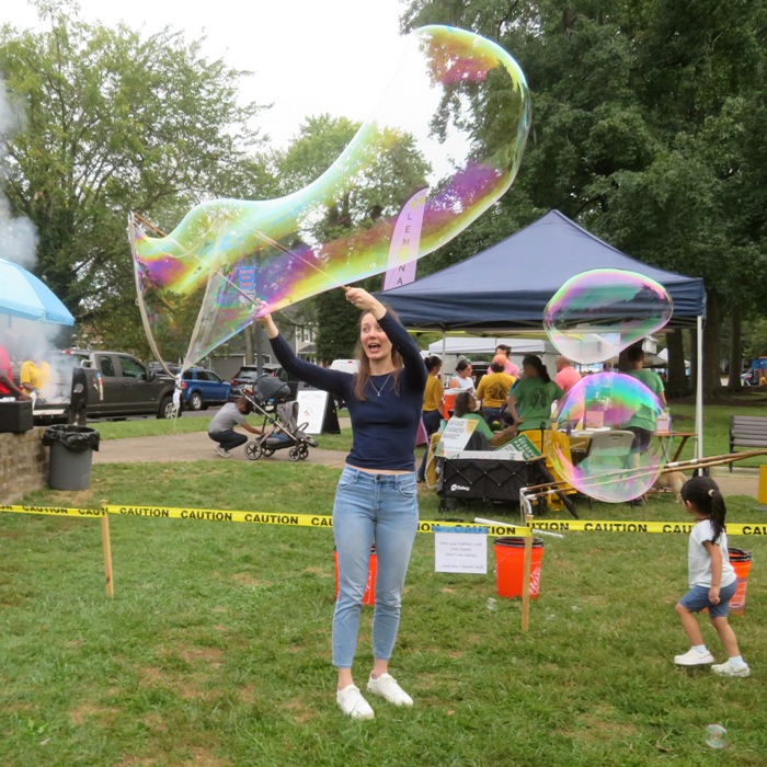 Making bubble with the small wand