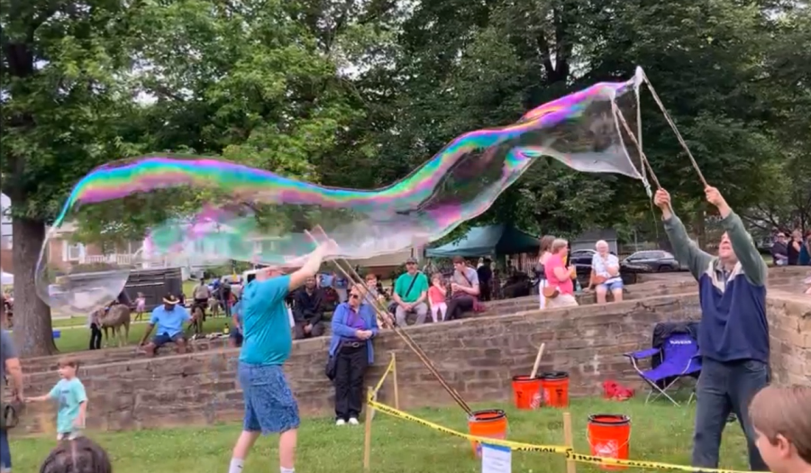 Making a long bubble with the small wand