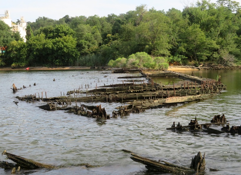 Front view of shipwreck with lots of iron rods sticking out