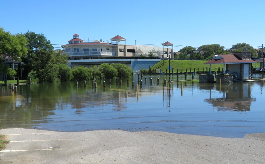 High water completely covered the boat ramp and part of the parking lot