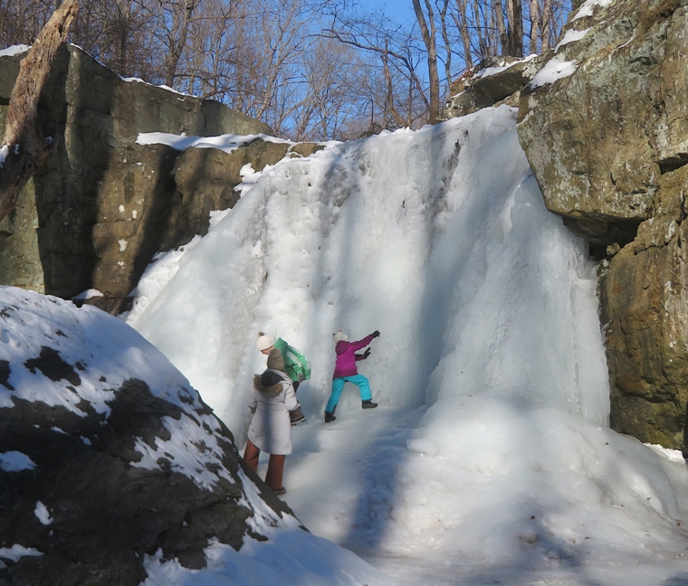 Kids playing at the falls