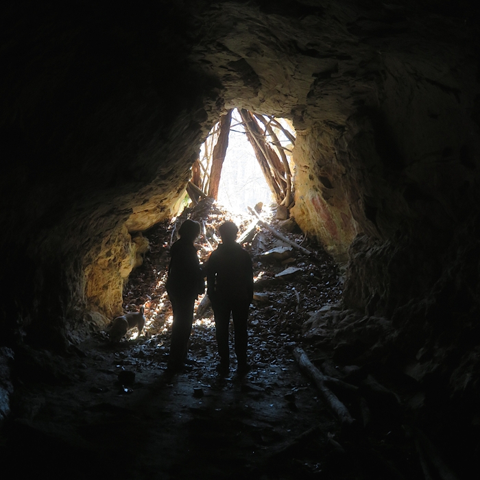 Norma and her nephew inside but near the entrance to the mine